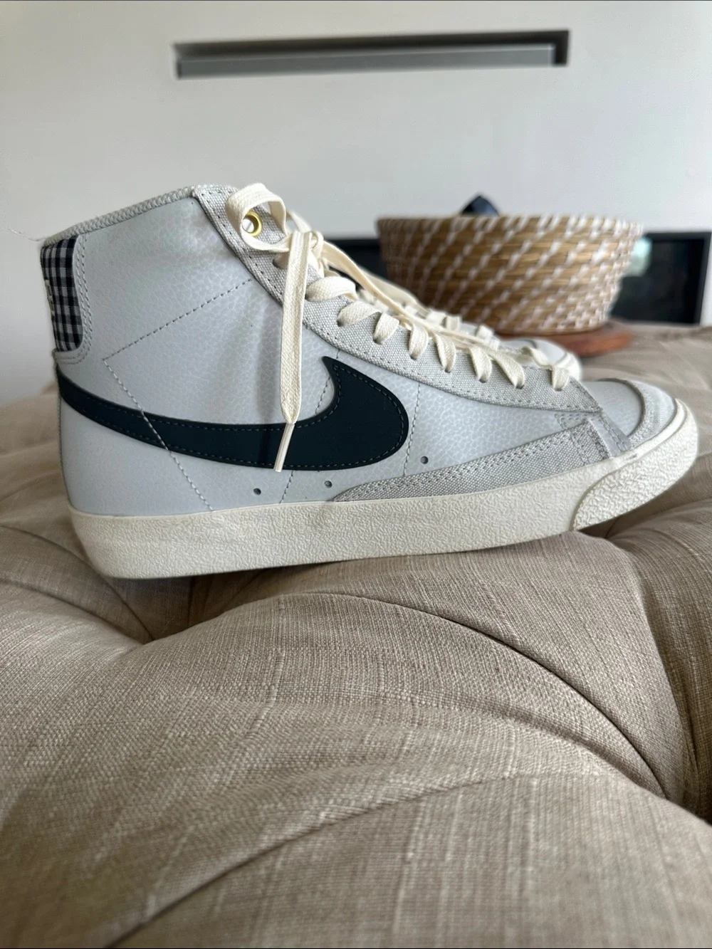 Nike High-Top Sneakers in White with Black Swoosh